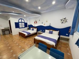 Letto o letti in una camera di Zi Jìng Fang Inn