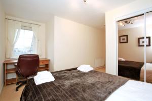 Cama o camas de una habitación en Fonthill Apartments