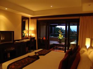 Ein Bett oder Betten in einem Zimmer der Unterkunft Bo Phut Resort and Spa - SHA Plus