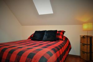 Letto o letti in una camera di Chalet Rustique CRDS Tremblant