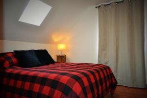 Letto o letti in una camera di Chalet Rustique CRDS Tremblant