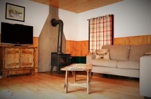 TV o dispositivi per l'intrattenimento presso Chalet Rustique CRDS Tremblant