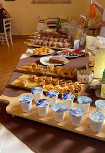 a table with a bunch of different types of food at Agriturismo La Caffettiera in Sparanise