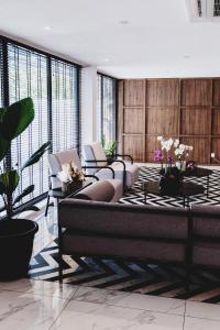 Posezení v ubytování Monocolo Boutique Hotel