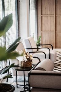 Posezení v ubytování Monocolo Boutique Hotel
