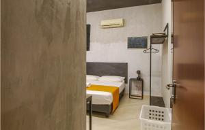 Posteľ alebo postele v izbe v ubytovaní Cozy Apartment In Porto Santelpidio