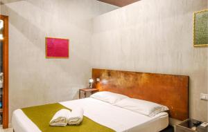Posteľ alebo postele v izbe v ubytovaní Cozy Apartment In Porto Santelpidio