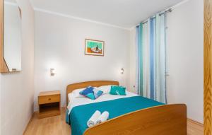 Postel nebo postele na pokoji v ubytování 2 Bedroom Nice Apartment In Pinezici