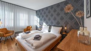 Postel nebo postele na pokoji v ubytování Apartment am Grundlsee