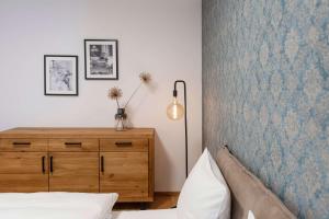 Łóżko lub łóżka w pokoju w obiekcie Apartment am Grundlsee