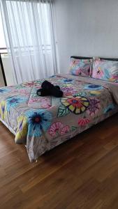 Ліжко або ліжка в номері GALAXY HOME Batu Ferringhi