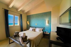 TV a/nebo společenská místnost v ubytování Sikania Eco Resort