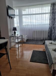 Postel nebo postele na pokoji v ubytování Figaro Apartaments