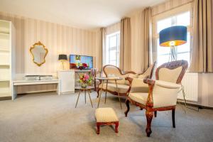 TV a/nebo společenská místnost v ubytování Hotel Busch