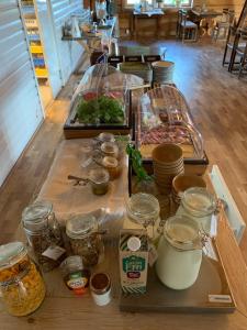 a table filled with food on top at Åkulla Outdoor Resort in Rolfstorp