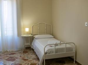 Llit o llits en una habitació de La Casa della Nonna