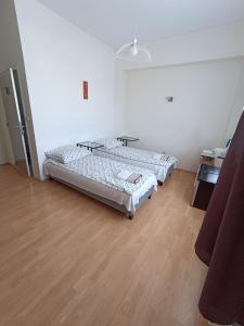 Postel nebo postele na pokoji v ubytování Figaro Apartaments