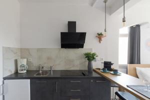 A kitchen or kitchenette at Nereid Apartment