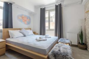 A bed or beds in a room at Nereid Apartment Még 6 kép