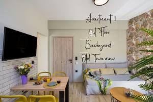 TV a/nebo společenská místnost v ubytování Dandelion apartments