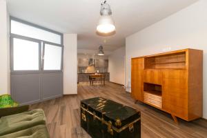 Kuchyň nebo kuchyňský kout v ubytování Roomy and Cozy Apartments Lingotto