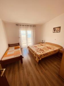 Postel nebo postele na pokoji v ubytování Apartments with parking space Metajna, Pag - 527