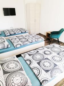 Posteľ alebo postele v izbe v ubytovaní Apartmány Plzeň Zábělá 69