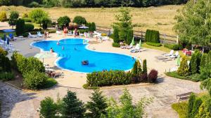 an overhead view of a swimming pool in a resort at Aspen Valley Studio Apartment Аспен Вали студио апартамент in Razlog