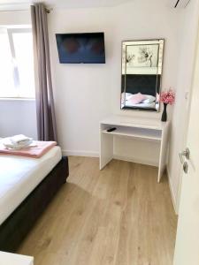 Posteľ alebo postele v izbe v ubytovaní Hotel B&B CHAMBERLAIN