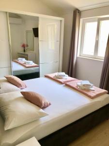 Posteľ alebo postele v izbe v ubytovaní Hotel B&B CHAMBERLAIN