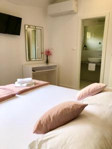 Posteľ alebo postele v izbe v ubytovaní Hotel B&B CHAMBERLAIN
