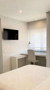 TV a/nebo společenská místnost v ubytování Ocean View Luxury Apartment