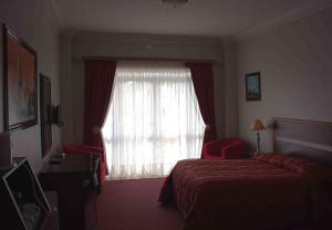 Postel nebo postele na pokoji v ubytování Hotel Mount Maluti - Lesotho
