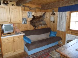 Posezení v ubytování Bergheim Schmidt, Almhütten im Wald Appartments an der Piste Alpine Huts in Forrest Appartments near Slope