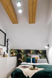 Postel nebo postele na pokoji v ubytování OW Mewa domki apartamenty nad jeziorem