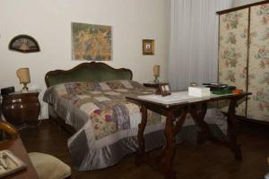 Posteľ alebo postele v izbe v ubytovaní Palazzo Altinate - Note di Piano