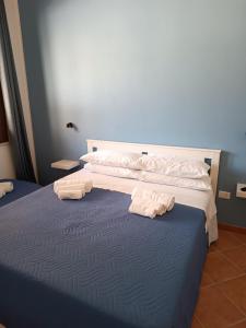Postel nebo postele na pokoji v ubytování Ilary's Rooms