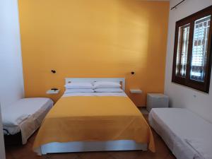 Postel nebo postele na pokoji v ubytování Ilary's Rooms