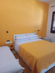 Postel nebo postele na pokoji v ubytování Ilary's Rooms