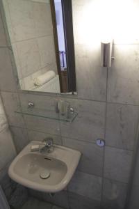 Koupelna v ubytování Apado-Hotel garni + 20 fotografií