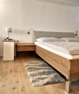 Łóżko lub łóżka w pokoju w obiekcie Ferienwohnungen Anna Balazs