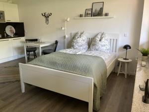 Ein Bett oder Betten in einem Zimmer der Unterkunft Fewo Lotte