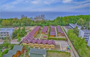 an aerial view of a building with purple roofs at Stunning Home In Sianozety With Kitchenette in Sianozety