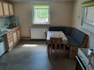 Kuchyň nebo kuchyňský kout v ubytování Panoráma Apartman