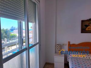 Łóżko lub łóżka w pokoju w obiekcie Apartamento Paseo del Malecón - Garrucha