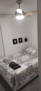 Posteľ alebo postele v izbe v ubytovaní Apartamento CANDELA