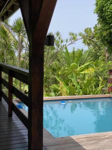 a view of a swimming pool from a house at Villa NO&LO in Sainte-Anne