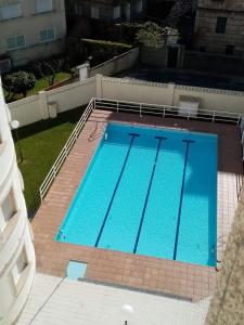 Fotografia z galérie ubytovania Apartamento en edificio nuevo con piscina, con vistas a la ría y al puerto, perfil familiar, no se admiten grupos de jóvenes v destinácii Sanxenxo