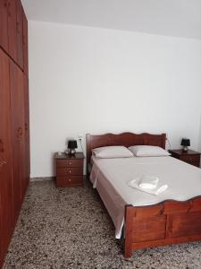 Postel nebo postele na pokoji v ubytování Kostas Maria Apartment 109m2 1st Floor