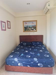 En eller flere senge i et værelse på Jomtien Beach Condominium resort minimum stay 29 nights